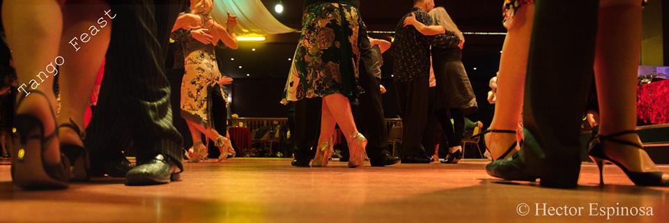 a milonga with couples on the dance floor